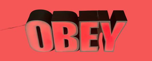 OBEY the Light: A Bold Statement for Your Space Make a powerful statement with the OBEY Illuminated Sign, a striking and oversized piece of decor that commands attention. Designed to inspire and provoke thought, this sign is more than just a decorative it