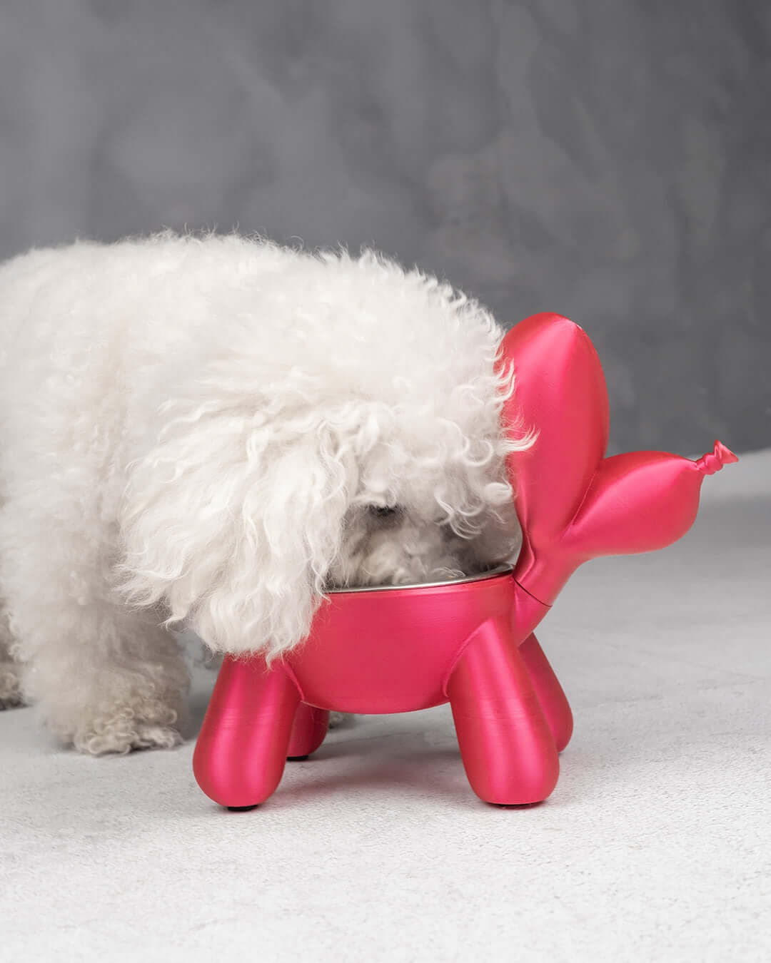 Pup Bowl: A Playful and Sustainable Mealtime Solution Turn mealtime into a joyful experience for your furry friend with the Pup Bowl, a charming and eco-friendly feeding solution that combines functionality with fun. Crafted from durable, biodegradable PL
